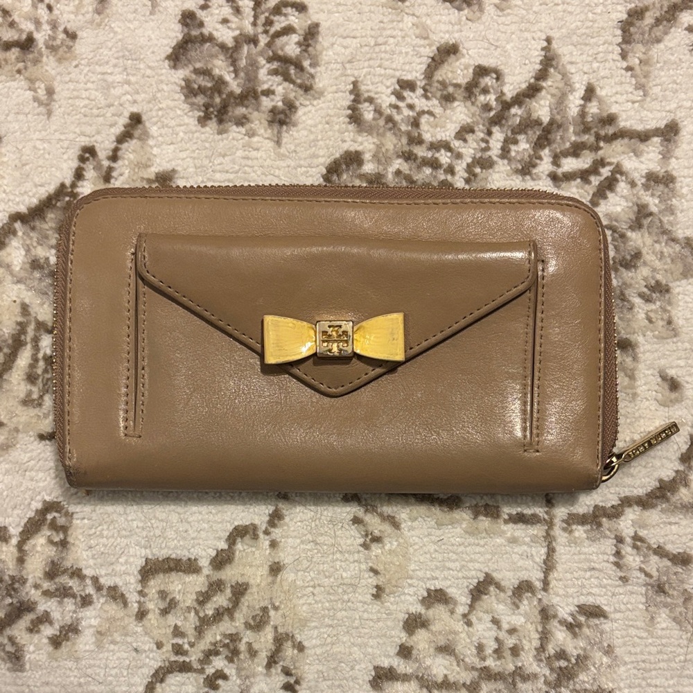 Elegant Tan Wallet with Gold Bow by Tory Burch